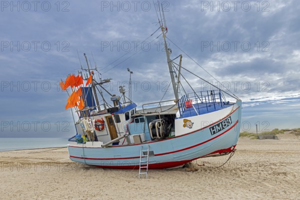 Fishing boat beached on Thorup Strand, Thorupstrand, fishing village on the Skagerrak in Jammerbugt Municipality, North Jutland Region, Denmark
