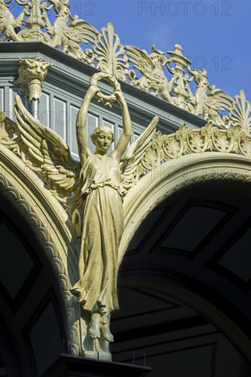 Nike goddess of victory, griffins and palmettes decorating 1885 Kiosk, music pavillion at the Citadel park in the city Ghent, East Flanders, Belgium