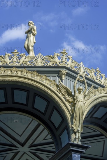 Greek Muze Erato, goddess Nike, griffins and palmettes decorating 1885 Kiosk, music pavillion at the Citadel park, city Ghent, East Flanders, Belgium