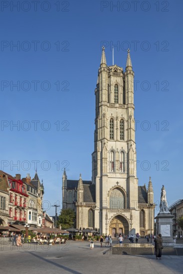 Saint-Bavo's square showing St. Bavo's cathedral, Sint-Baafskathedraal and pavement cafés in the city Ghent in summer, East Flanders, Belgium