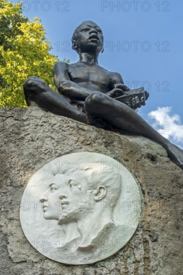 Monument for Lieven van de Velde with brother Jozef and Sakala, Het Moorken on rock at the Citadelpark, city park at Ghent, East Flanders, Belgium