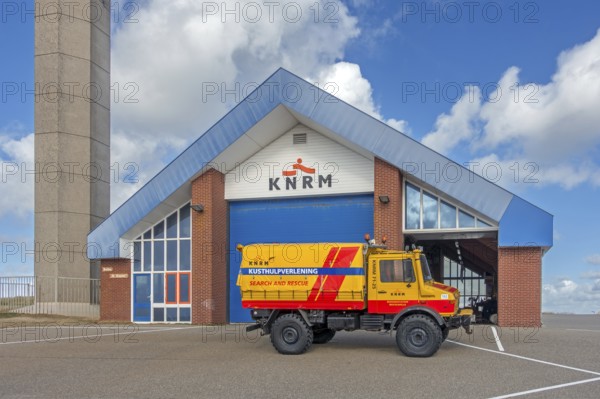 Koninklijke Nederlandse Redding Maatschappij, KNRM, truck in front of sea search and rescue lifeboat station at Westkapelle, Zeeland, Netherlands