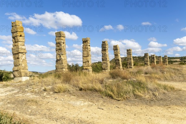Stone columns of ancient aqueduct, Roman site of Los Banales, near Layana, Zaragoza province, Aragon, Spain