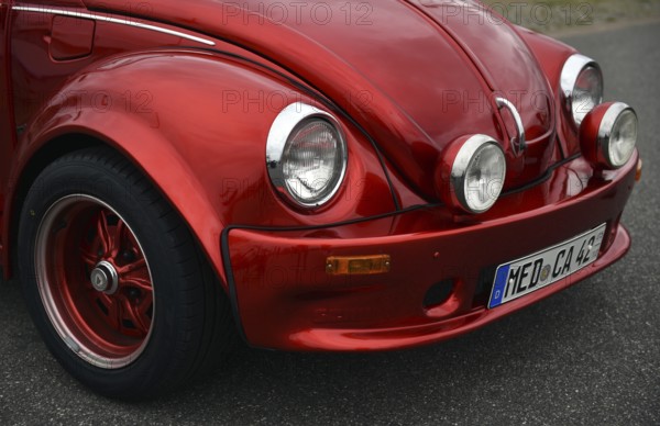 Red VW Beetle at classic car meeting in Büsum, Schleswig-Holstein, Germany