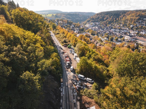 Construction site on railroad tracks in an autumn landscape next to a village, construction of Hermann, Hesse, Bahn, Calw, Germany