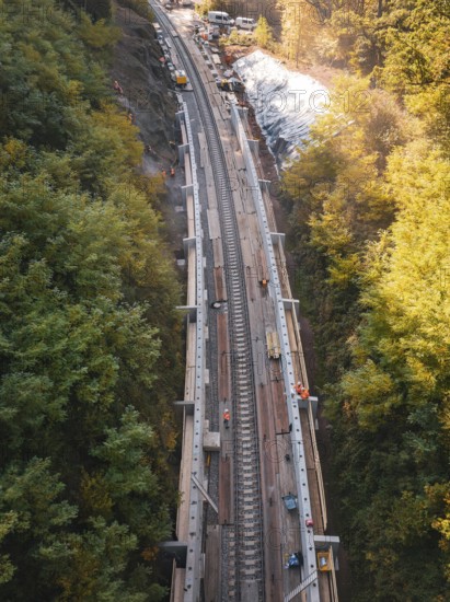 Rail system in a wooded, autumnal area with ongoing construction, construction of Hermann, Hesse, Bahn, Calw, Germany