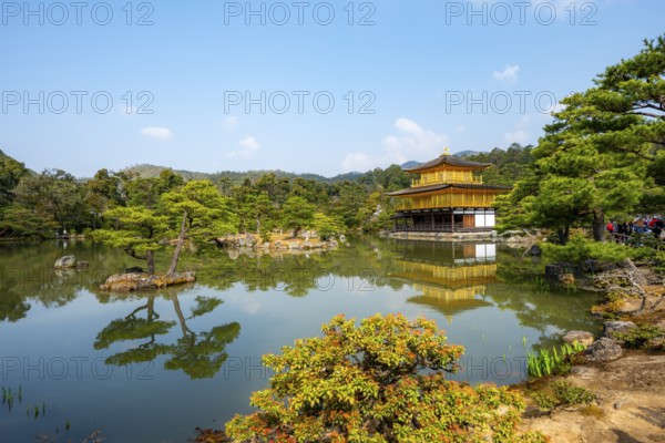 Golden Pavilion reflected in pond, Japanese garden, Golden Pavilion Temple, Kinkaku-ji reliquary, Buddhist temple complex, Kyoto, Japan