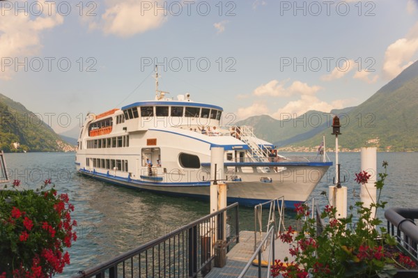 Sightseeing boat on Lake Como, Italian Lago di Como, one of the Upper Italian lakes, Lombardy region, Italy