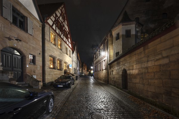 Nocturnal view of an old town alleyway with historic buildings, Lauf an der Pegnitz, Middle Franconia, Bavaria, Germany