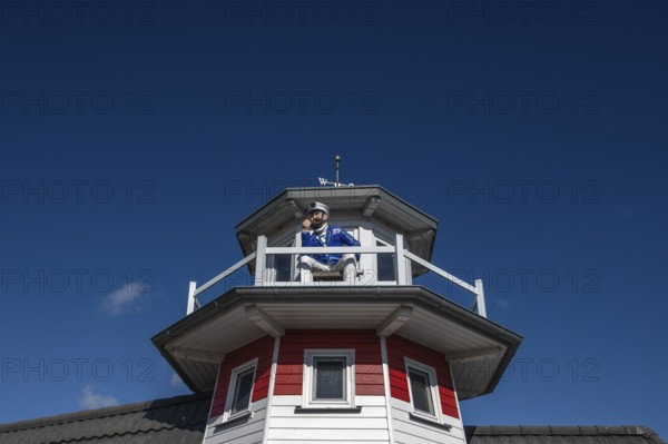 Captain figure on the balcony of a holiday home, Zingst, Darß, Mecklenburg-Western Pomerania, Germany