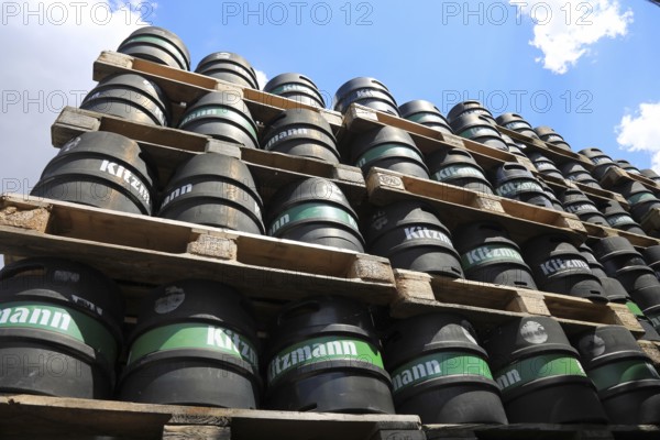 Black stacked beer kegs from the Kitzmann brewery, founded in Erlangen in 1712. Following the closure of the brewery in 2018, the trademark rights were taken over by the Kulmbacher brewery and beer production was relocated to Kulmbach, editorial