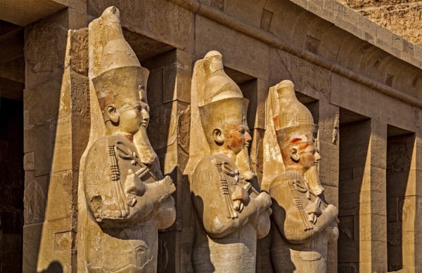Osiris statues of Hatshepsut on the second terrace - partly with original paint remains, mortuary temple of the pharaoh Hatshepsut - Deir el-Bahari, Luxor, West Thebes, Egypt, Thebes, West