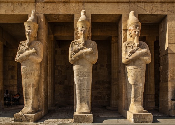 Hatshepsut's larger-than-life (5 m) Osiris statues in the middle colonnade, statues in the robe of the god Osiris, mortuary temple of the pharaoh Hatshepsut - Deir el-Bahari, Luxor, Thebes West, Egypt, Thebes, West