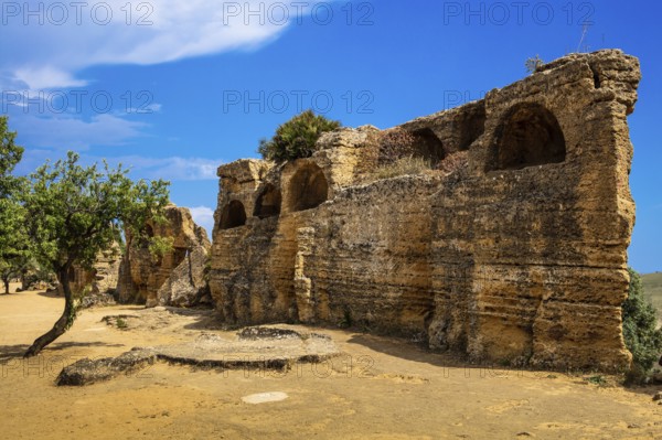 City wall with arcosol tombs, Valley of the Temples, Agrigento, Sicily, Italy