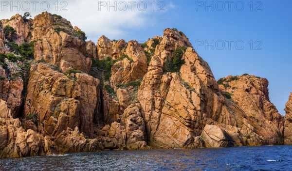 Rock formations and deep blue water in Scandola Nature Reserve, Corsica, Corsica, France
