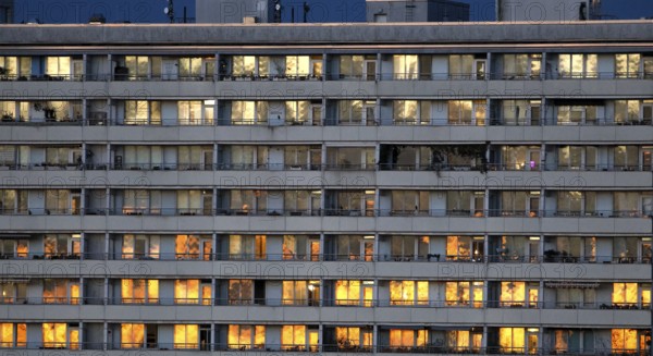Prefabricated high-rise building with illuminated apartments on Alexanderplatz, Berlin, 05.11.2025, Berlin, Berlin, Germany