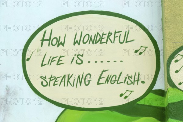 Speech bubble of song 'How Wonderful Life is' promoting English language school college, Zaragoza, Aragon, Spain