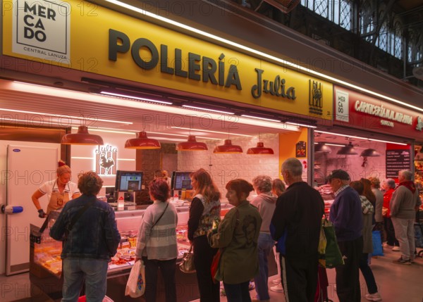 Market stall shop store selling chicken meat products inside Mercado Central de Zaragoza, Zaragoza, Aragon, Spain