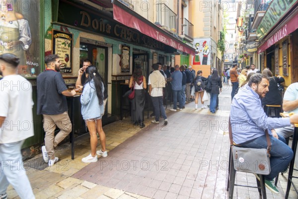 People outside tapas bars in El Tubo area of the Old Town, Zaragoza, Aragon, Spain