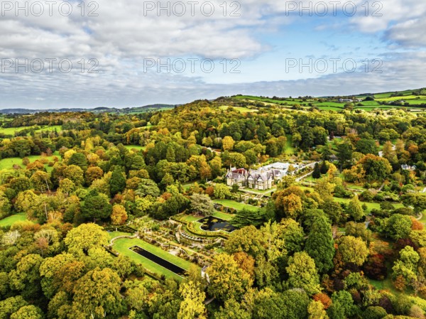 Autumn colours over Bodnant House and Garden from a drone, Conwy River, Colwyn Bay, Conwy, Wales, England, United Kingdom