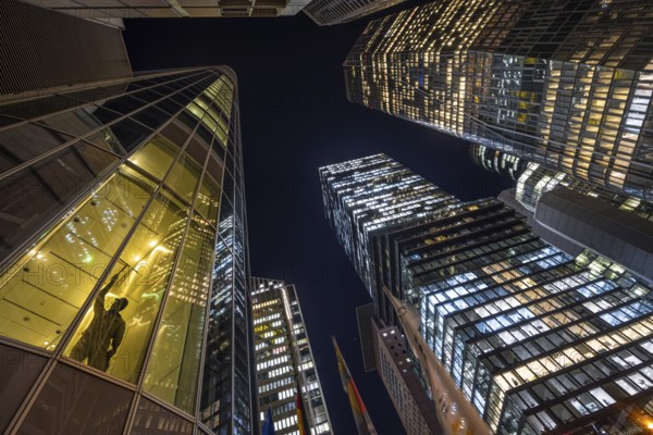 The lights of Frankfurt's banking skyline glow in the evening, Frankfurt, Hesse, Germany