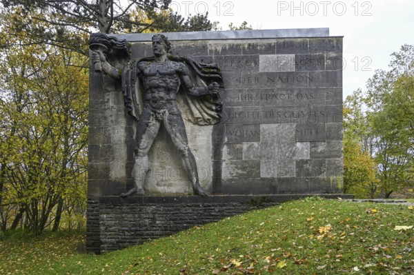 Torchbearer, monumental stone sculpture from the Nazi era, former NS Ordensburg Vogelsang, Eifel National Park, Schleiden-Gemünd, North Rhine-Westphalia, Germany