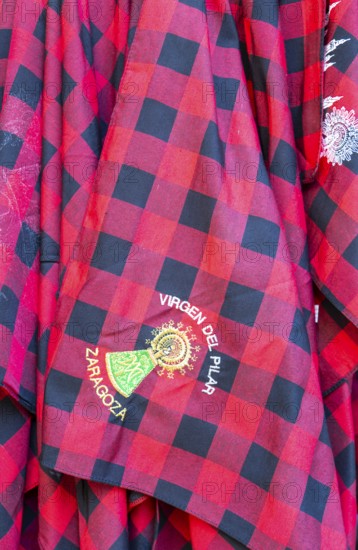 Traditional red chequered scarf worn during fiesta Virgen del Pilar Zaragoza, Aragon, Spain