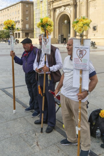 Men saying rosary prayers for human life, Rosario Por La Vida, Zaragoza, Aragon, Spain