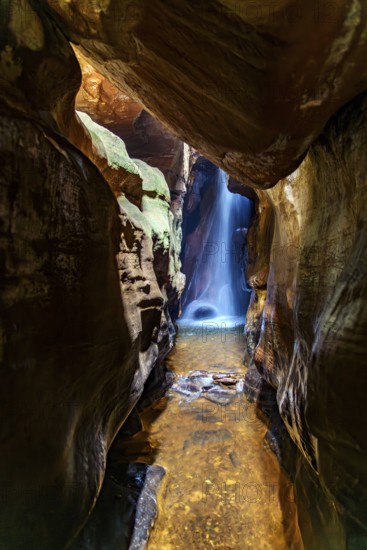 Waterfall inside a cave in Ouro Preto, Minas Gerais state, Ouro Preto, Minas Gerais, Brazil