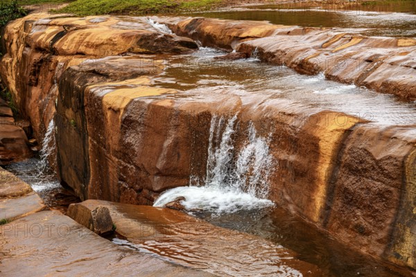 River flowing over rocks and forming small waterfalls in the state of Minas Gerais, Brazil, Minas Gerais, Brazil