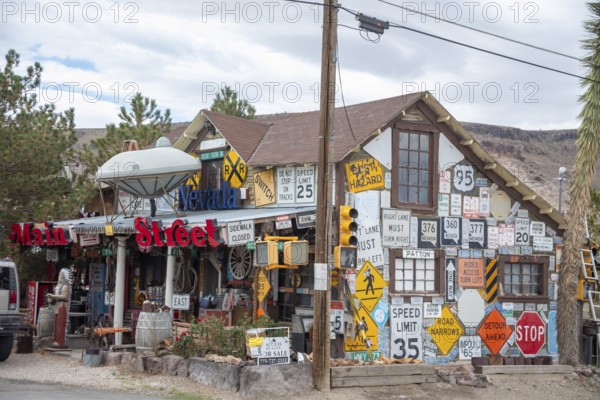 Goldfield, Nevada - An old house covered by road signs