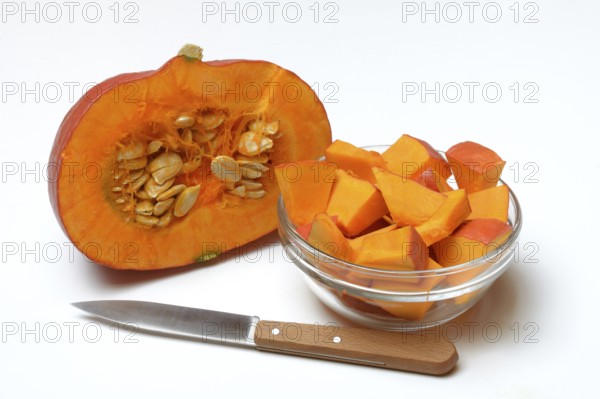 Hokkaido pumpkin, sliced with a knife