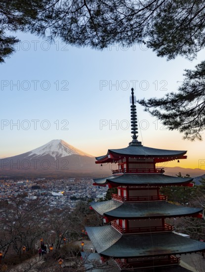 Five-story pagoda of a Shinto Shrine, Chureito Pagoda, with views of Fujiyoshida City and Mount Fuji volcano at sunset, Arakura Fuji Sengen Shrine, Arakurayama Sengen Park, Yamanashi Prefecture, Japan