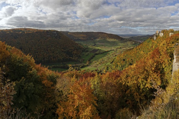 Panoramic picture of golden autumn in the Swabian Jura with colorful leaves and Reussenstein castle ruins, Göppingen, Germany