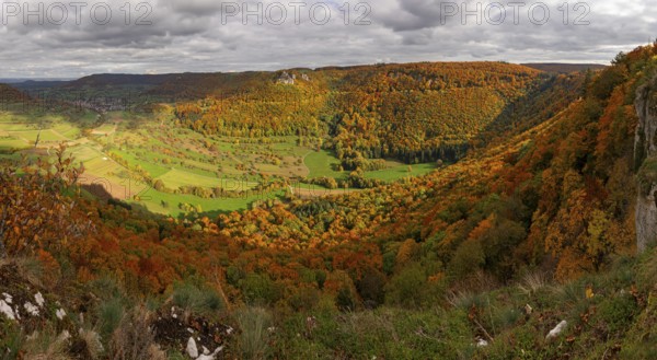 Panoramic picture of Indian Summer on the Swabian Jura in the Nenninger Valley with Reussenstein Castle Ruins