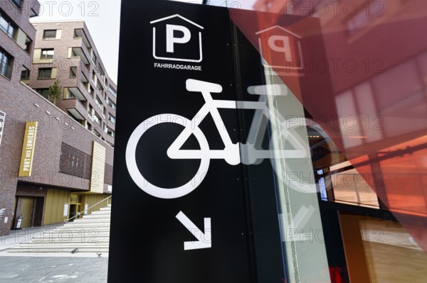 Sign with inscription, pictogram, bicycle garage, bicycle parking garage at the museum, Port des Lumières, Westfield Überseequartier, modern shopping center, HafenCity, Hamburg, Germany