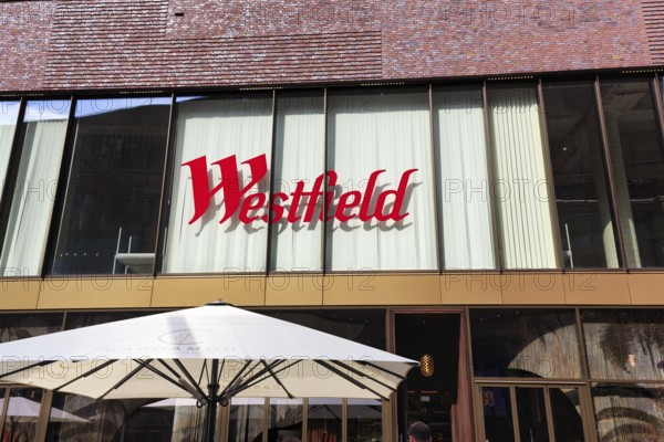 Lettering on glass façade, Westfield Überseequartier, modern shopping center, HafenCity, Hamburg, Germany