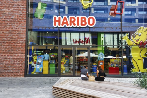 Glass façade, colorful shop window with Haribo lettering, Westfield Überseequartier, modern shopping center, HafenCity, Hamburg, Germany
