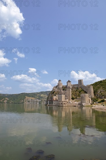 Golubac Fortress or Kolumbatz or Pigeon Town or Pigeon Castle on the Danube, in the background the Ðerdap National Park and Romania, Golubac, Serbia