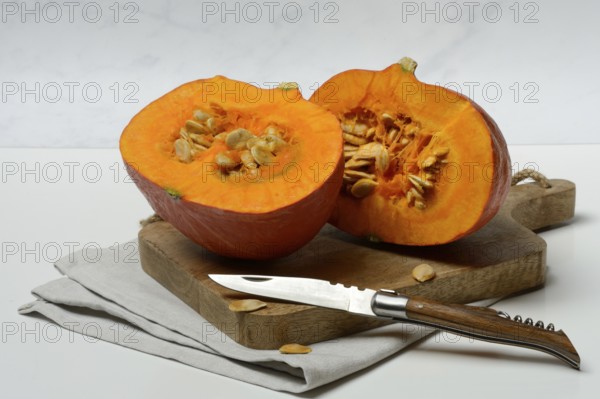 Hokkaido pumpkin, sliced with a knife