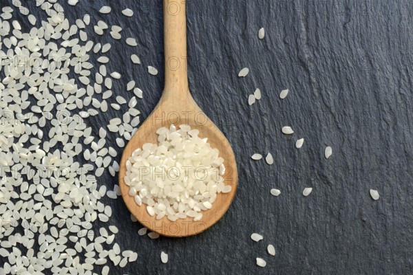 Rice grains in cooking spoons, rice
