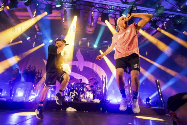 Carlito (Carlos Charlemoine) and Mal Élevé (Pablo Charlemoine), singers from Irie Révoltés live on Irieunion - Le Re-Tour pour une année! Tour in Berlin's Columbiahalle on 31.10.2025