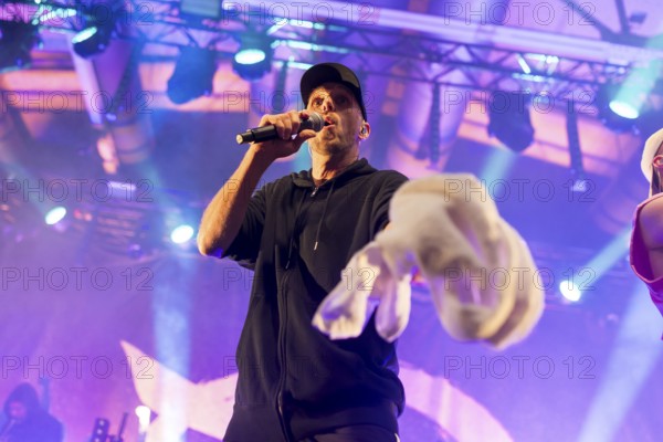 Carlito (Carlos Charlemoine), singer of Irie Révoltés live on Irieunion - Le Re-Tour pour une année! Tour in Berlin's Columbiahalle on 31.10.2025