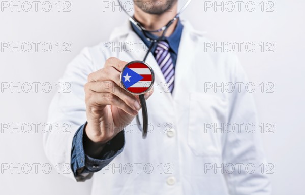 Puerto Rico healthcare system, doctor holding stethoscope. Puerto Rico health and medical insurance concept