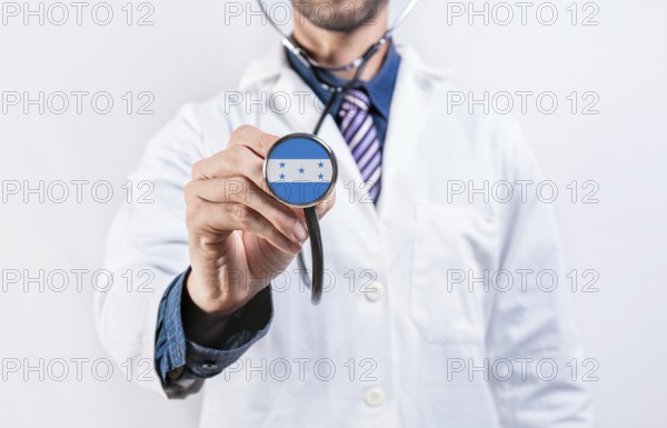Honduras healthcare system, doctor holding stethoscope. Honduras health and medical insurance concept