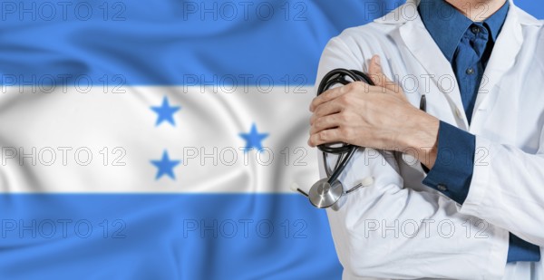 Honduran healthcare concept. Doctor with stethoscope on Honduras flag. Doctor holding stethoscope on Honduran flag