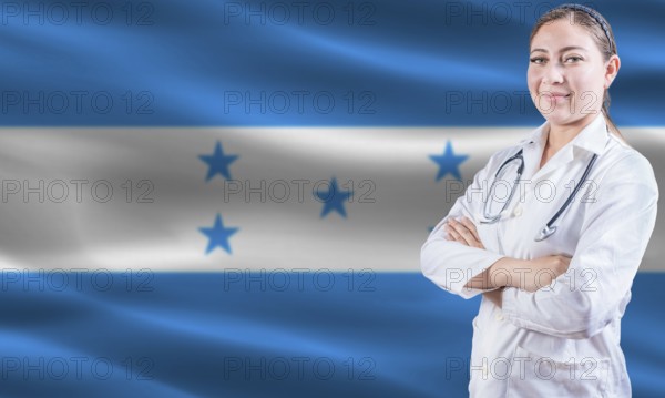 Female doctor on Honduras flag. Doctor with crossed arms on Honduras flag. Honduran health and care concept