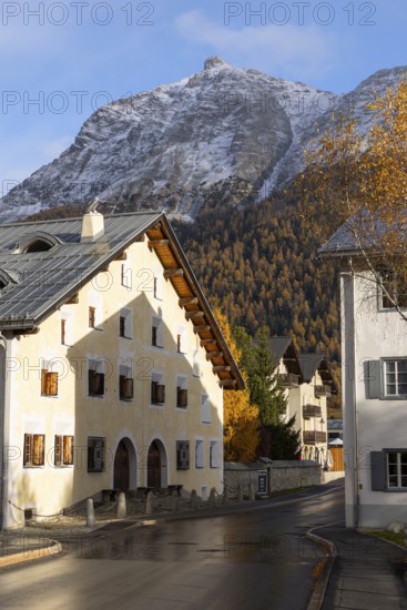 Engadin House, autumn, Piz Mezzaun, mountain peaks with snow, La Punt Chamue, Engadin, Graubünden, Switzerland