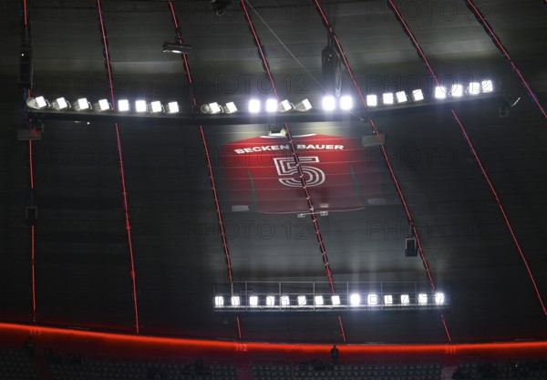 Large-than-life jersey in memory of Emperor Franz Beckenbauer with the back number 5 hangs in the grandstand roof of the Südkurve, 125th anniversary of FC Bayern Munich FCB, Strahlkraft, Allianz Arena, Munich, Bayern, Germany