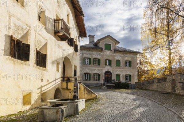 Engadin houses, historic houses, Dorstrasse with houses, birch, autumn, Guarda, Engadin, Grisons, Switzerland